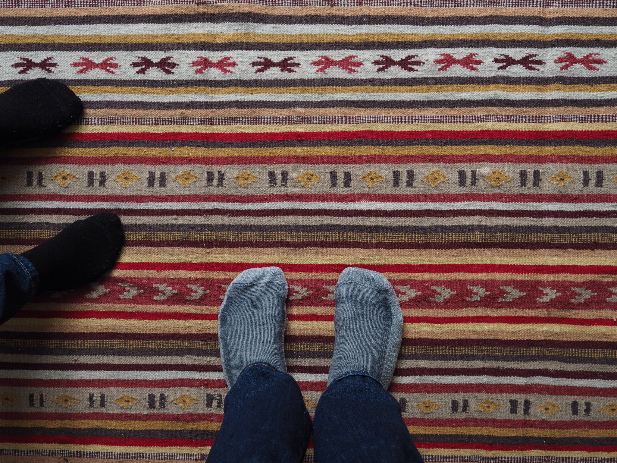 Untitled, socks, jeans, rug